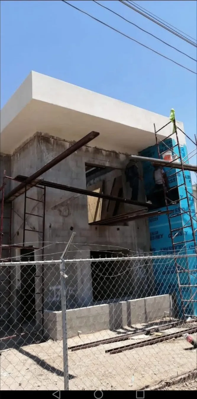 Aplicación de acabados en la fachada